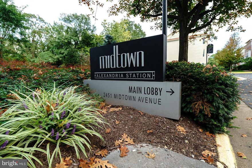 Welcome to Midtown Alexandria Station, a luxury high-rise across from the Huntington Metro! This 2BR/2BA condo features an open layout, floor-to-ceiling windows, granite/stainless kitchen with breakfast bar, and fresh paint with new carpet throughout.

The primary suite offers a walk-in closet and spa-like bath with dual vanity, soaking tub, and shower. A second bedroom and full bath are perfect for guests or a home office. Enjoy city views from your private balcony.

Includes two parking spaces (garage + surface). Amenities: rooftop pool, fitness center, clubroom, 24/7 concierge. Minutes to Old Town, Amazon HQ2, National Harbor, I-495, and DC.