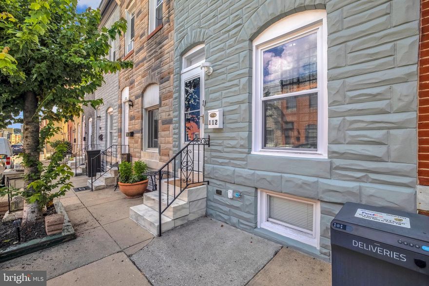 Welcome to this Charming Rowhome in Prime Location - Baltimore's Patterson Park Neighborhood! Move-in ready, two-bedroom, two-bathroom home features an open floor plan, a modern kitchen with stainless steel appliances, and exposed brick accent walls. The finished basement provides extra living space with upgrades throughout.  Major systems have been recently replaced, including a new roof, updated electrical and plumbing, new windows, doors, and HVAC. Also, you can enjoy the convenience of an added parking pad. Just  minutes from Canton, Fells Point, and Harbor East, offering top tier dining, shopping and waterfront views. Easy access to John Hopkins Hospital and convenient to I-95, I-895 and public transit for commuters.