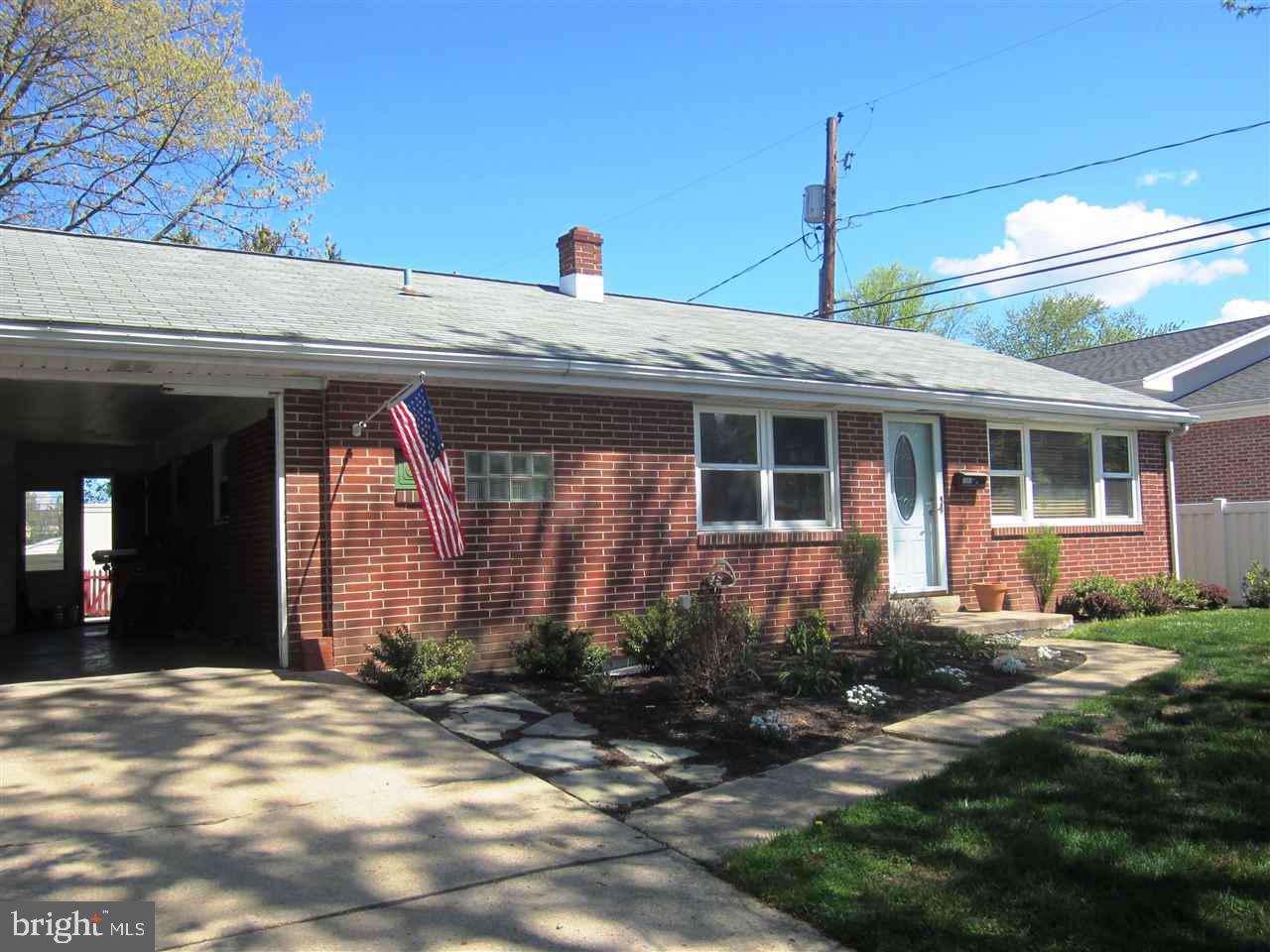 Enjoy one-floor living in this brick 3 bed Ranch home located in desirable Highland Estates neighborhood. This wonderful home features hardwood floors, updated bath w/ ceramic tile, newer windows, large carport that can possibly be converted to garage, & fenced in backyard w/ deck & patio for all your backyard entertaining. Partially finished LL for extra living space and plenty of storage. Great house, Great location!