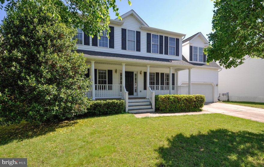 Perfect house in a perfect location! 4 bedroom colonial with a front porch PLUS 3 levels with over 2600 square feet finished! Wood floors and 9 foot ceilings on  main level*Wood burning fireplace in the family room*NEW stainless steel  appliances*4 bedrooms on upper level including a 15 x 11 bonus room perfect for teenagers! Large laundry room on the upper level with easy access from bedrooms*Full basement has a finished bathroom and outside walkout entrance*Fenced in rear yard plus a 10 x 12 deck*Concrete driveway*Dual zone HVAC with 2 systems*NEW gas water heater*Convenient neighborhood with sidewalks just 5 minutes to VRE and downtown Fredericksburg*