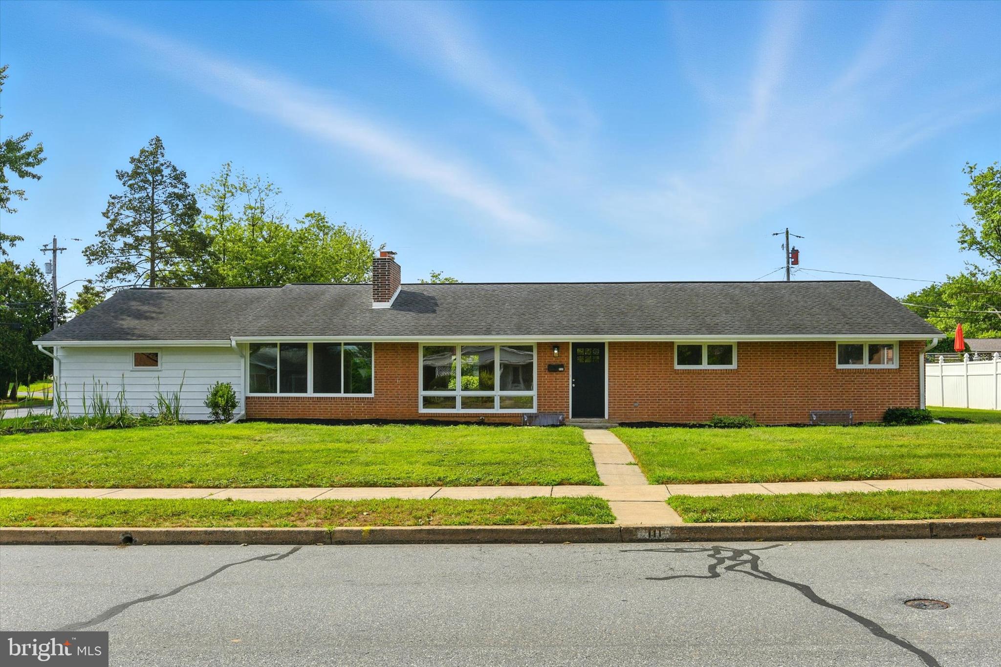 Welcome to this sprawling, beautifully renovated ranch home on a desirable double corner lot in Highland Park! Step inside to a spacious family room featuring luxury vinyl plank floors, floor-to-ceiling windows that fill the space with natural light, and a charming brick wall wood-burning fireplace. The updated kitchen shines with quartz countertops and brand-new stainless steel appliances, while the adjoining dining area is perfect for gatherings. A versatile living room with recessed lighting, ceiling fan, and access to the outdoors offers endless options as an office, playroom, or additional lounge space. Three bedrooms and an upgraded full bath complete the main level. The unfinished basement provides excellent storage or the potential for future living space with a convenient half bath already in place. Outside, enjoy the level yard—ideal for entertaining, play, or relaxation. A two-car garage and long driveway ensure ample parking. Major updates include a brand-new HVAC system, 200-amp electric (2025), new floors throughout, fresh custom interior and exterior paint, new light fixtures, some newer windows, new doors and slider, upgraded bathrooms, and a new garage door. Every detail has been thoughtfully upgraded—nothing was overlooked. Conveniently located to shopping , dining and highways. A joy to own!