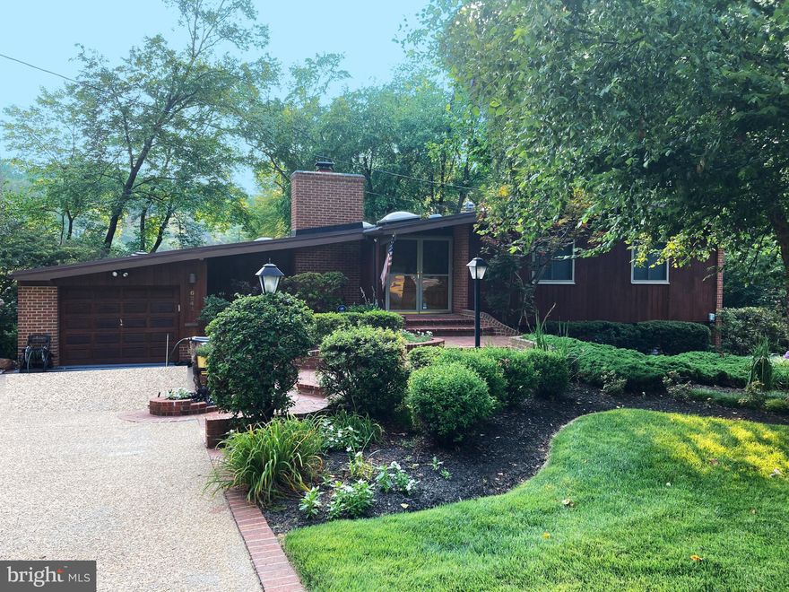 LAKE BARCROFT - Waterfront Contemporary! Gorgeous 3BR/3BA home with walls of glass, updated kitchen with granite and breakfast bar, built-ins, skylights, garage, and more! Rare flat lot with excellent water front! Lake Barcroft offers vacation living just minutes to Metro, Tysons, Arlington and DC!