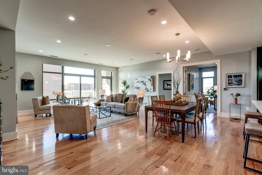 Discover the best of modern living in Old Town, Alexandria with this 2 bedroom plus den condominium at the popular Oronoco. Presenting  2,285 square feet of finished living space this condo features an open floor plan designed to provide the ultimate in contemporary comfort; ten foot ceiling heights, private den, large modern kitchen with center island and luxury finishes; living room with fireplace, wet bar and access to the balcony; dining area large enough for dinner parties; a primary bedroom suite with TWO walk-in closets and spa-like ensuite bath; secondary bedroom and DEN, ideal for a home office.  Other highlights of the unit include remote-controlled blinds, recessed lighting, and hardwood floors; the unit also comes with two deeded parking spaces and very large storage unit. World-class amenities include 24-hour concierge, pool, fitness center, yoga studio, club rooms, pet wash station and bike room. Ideally situated only a few blocks from vibrant King Street, less than a mile to both King Street and Braddock Road Metros, 4 miles to Reagan National Airport, 5 miles to Amazon's HQ2, and 7 miles to Washington DC.