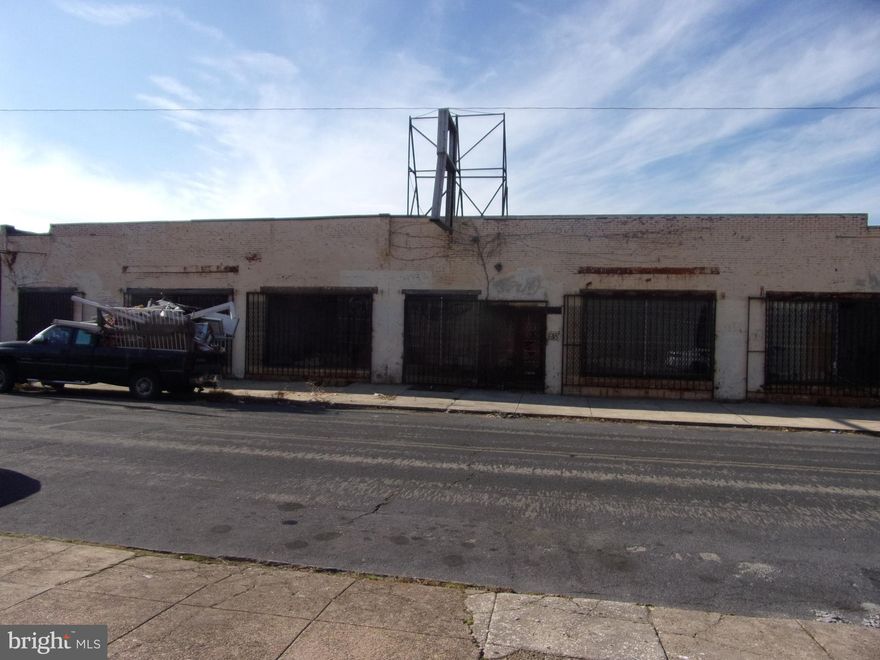 The space can be broken up into 3 unit /leases.  We are open to cutting up unit A that's currently 13,000SF  20,000  SF o f large open space. The property runs from street to street. The back units have a commercial roll up door.   Additional Lighting had been added. The wharehouse  is heated, electrical  and has a sprinkler system.  Owner would prefer to lease entire space to one tenant, however will consider   dividing the space
$8.00 per foot triplex net . Large bay is about  12 feet.  All offers will be considered