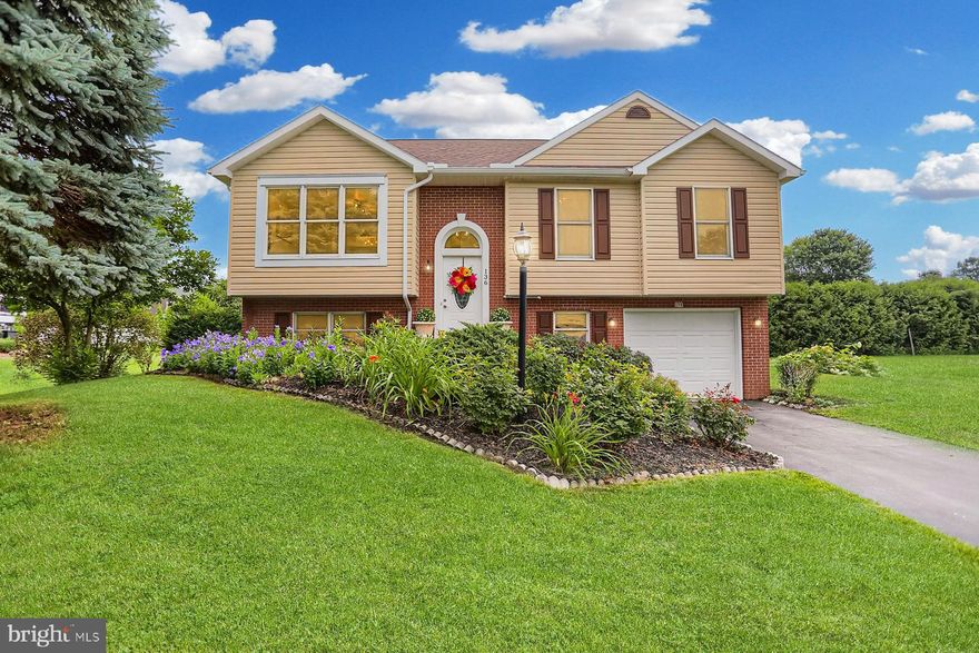 Nestled in the sought-after Steeplechase neighborhood, this inviting split-entry home offers a perfect blend of comfort, space, and convenience. Just minutes from I-99 and PA-26, you'll enjoy quick access to Bellefonte, State College, and all the dining and entertainment options in Pleasant Gap. Penns Valley is also just a short scenic drive away. Step upstairs into a sunlit, oversized living room that flows seamlessly into the dining area and kitchen—an ideal layout for everyday living and entertaining. The dining room offers direct access to the deck overlooking the backyard, perfect for indoor-outdoor meals and summer gatherings.
The primary suite includes a generous walk-in closet, while the finished lower level offers flexible space for guests, a home office, or a cozy family room. This level also features a second full bath with a shower, a laundry room, a utility closet for added storage, and access to the oversized garage. Outside, you'll find charming flower beds and plenty of space to garden, play, or relax. This home is move-in ready and waiting for its next chapter—come see it for yourself!