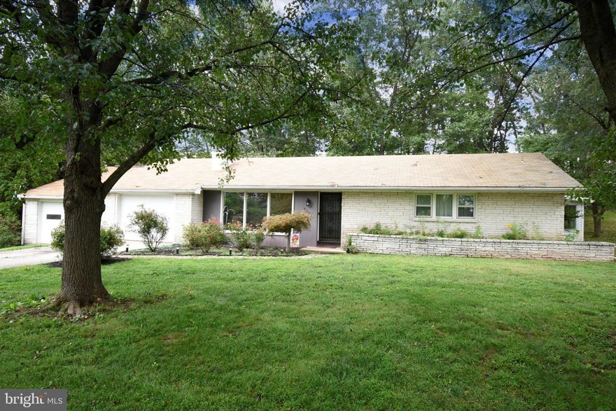 Welcome home to this recently updated, solid ranch-style home on a sprawling, private lot! One level living features updated flooring in living room, eat-in kitchen, laundry room, bathrooms and primary bedroom. Original hardwoods in two other bedrooms. Large enclosed Sunroom was updated with new flooring, paint and roof. Sprawling 2+ acre property features fruit and nut trees, two storage sheds, lots of open space and multiple different flowering, mature trees, berries and plants. Never pay for electricity again! Solar panels featured on roof as well as array hidden from the house, sell your unused electric and get money back instead! Full, clean, un-finished basement has plenty of room for storage or more living space, wood stove and large fireplace for supplemental heat. This is home is must-see, schedule your showing today!