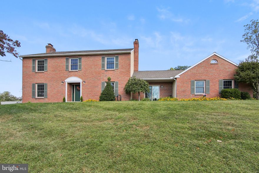 Downingtown East School System! Beautiful Colonial home on 1.5-acre hilltop property with stunning views and thoughtful updates throughout. This 4-bedroom, 2.5-bath residence blends timeless style with modern upgrades, offering comfort, functionality, and generous space inside and out. The main level features top-grade oak flooring, a tiled foyer, and two wood-burning fireplaces that bring warmth and charm. The vaulted ceiling in the family room enhances the open feel, while pocket doors provide flexibility between living areas.

The large kitchen with under cabinet lighting, space for eat-in table, and convenient breakfast bar with room for under counter stools.  Sliding glass doors off of the kitchen lead you to a 25' x 16' deck with Pergola and retracting canopy overlooking a landscaped backyard and level lawn, perfect for a playset or pool. The expansive laundry/mudroom includes a double sink and additional storage, complemented by abundant closet space, garage and second-floor attics. Updates include a new roof, new central air conditioner, new furnace compressor, new front and sliding doors, and new double-hung windows that tilt inward for easy cleaning.

Additional highlights include a whirlpool tub in the primary bath, recessed lighting, ceiling fans, custom window treatments, and a new Bosch dishwasher. Mechanical upgrades include a newer water heater, upgraded electrical panel, PEX plumbing conversions, and electric wall heaters in the basement which has walk-out access. Exterior features include a large 2-car garage, flat driveway pad for 6 more cars, 12' x 18' Amish-built A-frame shed pre-wired for electric, electric dog fence, and a replaced driveway apron.

Enjoy watching the sunset at your firepit with the cool hilltop breeze—a perfect way to end the day at this move-in-ready home in a serene and scenic setting.