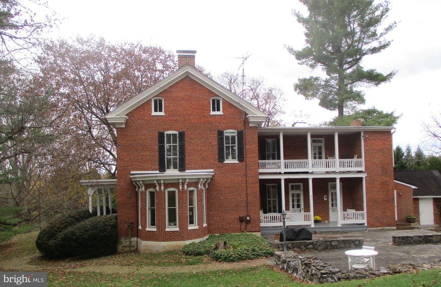 ANTIETAM NATIONIAL BATTLEFIELD AREA - SMALL TOWN LOCATION -  HISTORIC  HOME  - OFF MAIN STREET.  Two former Mayors of Keedysville have occupied this solid brick residence. 

4.0 Private Acres  within the Town of Keedysville.  Little Antietam Creek waterfront.  Private and secluded small farm located off Main St.   This Victorian residence has its original architectural detail work in place. Classic center-hall floor plan features a traditional 19th c.  walnut staircase + customized wood flooring.  Sited upon a rise high above the creek, the home enjoys southern-exposure. Vintage single-pane bay windows accented by interior fold-in shutters. Hand-crafted marble belt course is over the limestone foundation.  Lower level walnut paneled rec room.  HISTORY.  During the Battle of Antietam, John J. Keedy farm was on and near General McClellan's Headquarters Company at Keedysville. - Pre-Civil War bank barn c. 1850.  SPECIAL FEATURES:  (1) ideal home-office featuring Comcast cable & Verizon phone lines, parking  (2) bank barn & outbuildings for use by a hobbyist, artist, craftsperson, antique buff  (3) slate & stone patios for outdoor dining off the country kitchen porch  (4) public water, public sewer, & cable TV.  (4)  Tree farm located across the main entrance drive . (5) Separate deed conveys the continuously-flowing large spring and valuable spring house foundation (6) B&B posssiblr conversion ,  subject to Town approval. (7) Two Mayors have occupied the home: Christian Keedy and Charles Taylor.  BIRD SANCTUARY, LANDSCAPING & GROUNDS.  Twin stone patios 36' x 24' & 22' & 45'. Informal terraces, perennials; original & more recent stone walls, vintage brick walk ways;  variety of gardens; winding private entrance lane, ample parking.  Walled-in 19th c. natural spring overflow stream supports fresh watercress. Birds galore within creek valley ecosystem. Farmer mows fields.  NOTE:  Sale of listing is subject to recordation of  plat.  More land available for a total of 7.7 acres.  Please no drive-bys.