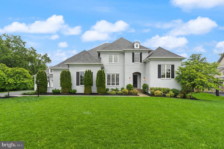 Step into your forever home in the highly sought-after Willowsford community. Tucked away on a private pipestem lot, this stunning Great Falls model by Drees Homes boasts an array of premium finishes and luxury upgrades throughout.  The house faces West.

The expansive main level features soaring 10-foot ceilings, a massive open-concept floor plan, and abundant natural light. The spacious family room, highlighted by a custom fireplace, flows seamlessly into a raised study, a generous dining room, a flex bonus room and a large mudroom with an adjacent half bath. The gourmet kitchen is a showstopper, featuring dual islands, quartz countertops, upgraded appliances, and more than ample storage. Step outside to the extended covered patio—wired for wall- or ceiling-mounted heaters—perfect for year-round entertaining.  A main-level en-suite bedroom and full bath provide a welcoming retreat for guests. 

Walk through the back staircase, you will find 9-foot ceilings and three additional generously sized bedrooms, each with its own walk-in closet. The luxurious primary suite offers a tranquil retreat, complete with a spacious walk-in closet and a spa-like bathroom featuring an oversized Roman shower. A conveniently located laundry room adds to the home’s everyday ease.  Last, but not least and not to be overlooked, this home also features a rare four-car garage—a true standout in Willowsford. 

The unfinished basement is brimming with potential, featuring 9-foot ceilings, a three-piece rough-in, extra windows, and large glass doors that open to a ground-level covered area (pre-wired for a hot tub), inviting in even more natural light.  With over 2,000 square feet, the basement is unfilled with endless opportunities. 

Located in the award-winning Willowsford community, this home is surrounded by the natural beauty of Loudoun's wine country. Enjoy resort-style amenities including community events, beach-entry swimming pools, a splash pad, lodge, fitness center, lake, dog parks, tot lots, a sledding hill, and even a treehouse! You'll also benefit from proximity to the expansive 250+ acre Hal and Berni Hanson Regional Park, local farmers markets and Dulles International Airport. 

With easy access to Dulles, Tysons, DC, and the Silver Line METRO—and zoned for top-rated Loudoun County public schools—this exceptional home offers the best of Northern Virginia living.  Come see what it means to be living!