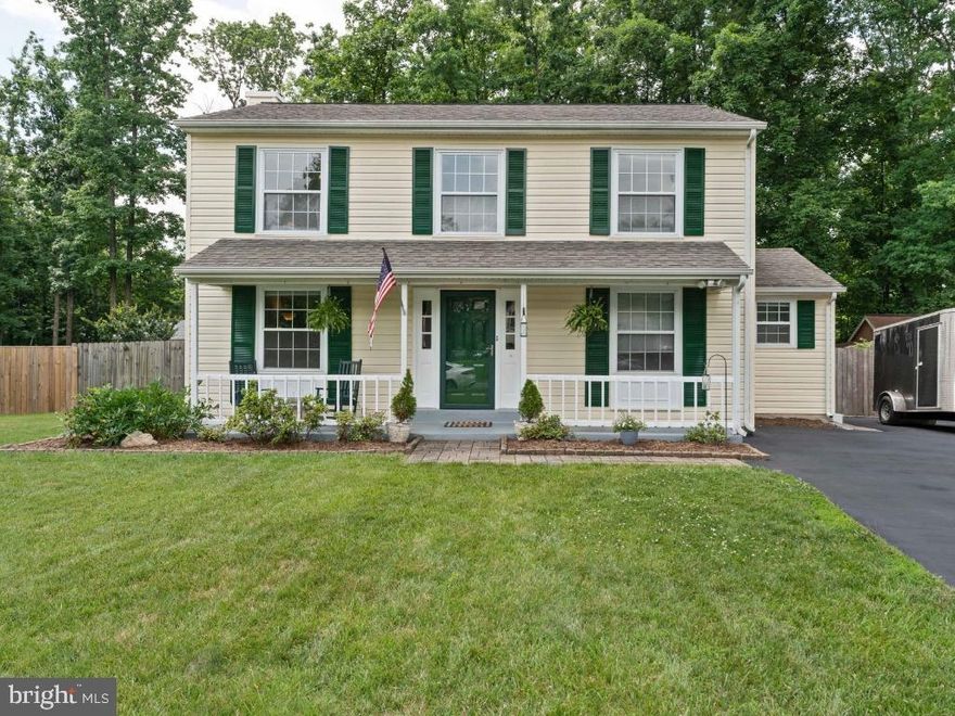 As you tour this three bedroom and two and a half bath traditional colonial, you will notice the upgrades and the attention to detail.  Enter the main level door into a smartly done floorplan with an oversized living room with a relined wood burning stone fireplace, a large kitchen, and separate dining room. The kitchen is designed with the chef in mind with ample counterspace with backsplash, tile, and a double oven.  A separate side entrance from the wide driveway brings you in through a laundry and mud room with a half bath.  Exit the living room through the French doors to an oversized deck for entertaining and a flat tree lined fenced private yard.  The deck is composite and easily maintained and a brand-new shed offers ample space for storage.  The upper level has three bedrooms and two full baths.  The primary bedroom has a large walk-in closet and upgraded full bath.  The main bath has an air tub and the two bedrooms of generous size. New carpet and fresh paint throughout the home!  Conveniently located to shopping and restaurants and only 20 minutes to Dulles International Airport.  No HOA but a pool membership is available in the community.  Fairfax County schools and located in the Westfields High School pyramid.  Plan to visit the home - IMPROVED PRICE!