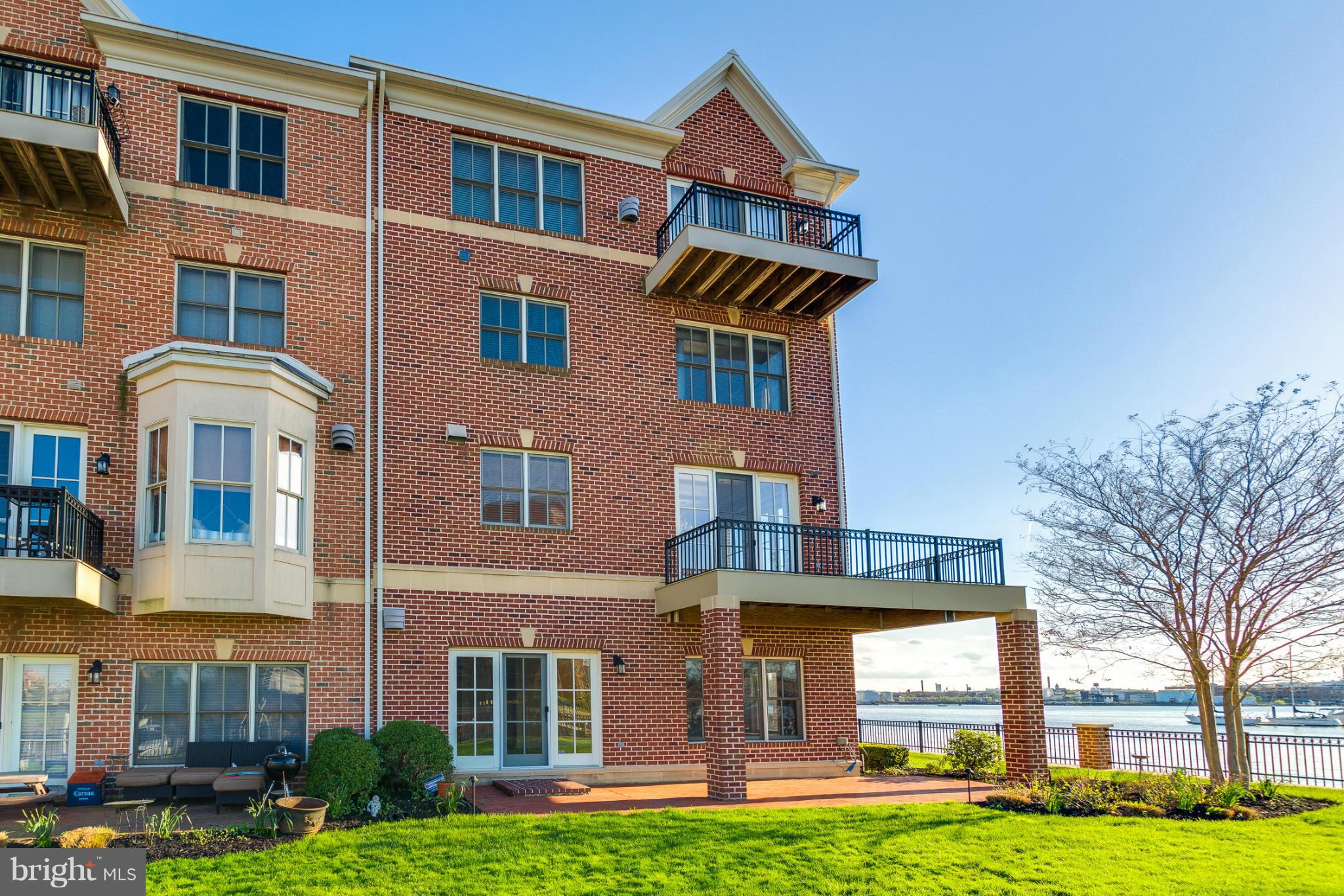 Live every moment as a vacation in this rarely available premiere end unit home located in the sought after waterfront, gated community of the Moorings. Enjoy sunsets off the wraparound balcony & water views from every room. Extra wide floor plan, elevator, expansive living area, and deluxe master suite are just a few of the highlights in this pristine waterfront home.