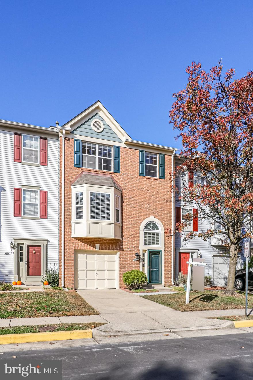 Welcome to 6036 Lands End Ln, a well maintained brick front townhome sought after Kingstowne. Located on a quiet street, this Bristol model home has three bedrooms, two full, two half baths featuring one car garage. Bright main level has bay windows, beautiful gleaming hardwood floors throughout, dining/living room combination layout and a good size eat-in kitchen with new refrigerator and dishwasher. Step out from the kitchen into spacious deck perfect for BBQ and entertaining.  Large primary bedroom has vaulted ceilings, plush carpet and primary bath features dual vanities. Lower level has a good size recreation room with wood floors, a fireplace and a walk-out opening up to spacious backyard with stone patio. Within an arm's reach to Kingstowne amenities, shopping, restaurants and major highways.