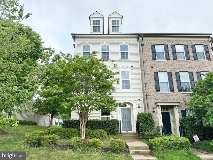 This stunning 3 level townhouse with hand-scraped hardwood floors throughout. Beautifully appointed home with upgraded built in shelving and bookcases, kitchen with granite and stainless steel, upgraded lighting fixtures, rear patio, detached 2 car garage. Master bedroom with tray ceilings and loads of natural light. Middle level has an additional family or sitting room/office with built in shelving plus a den on the upper level. The home is a short walk to the community pool, gym, Grounds Cafe, tot lots, walking trails, Embrey Mill sports fields, Jeff Rouse Centre, Publix, close to I-95 for north and south commuters.  Pets limited on a case by case basis but no large animals.