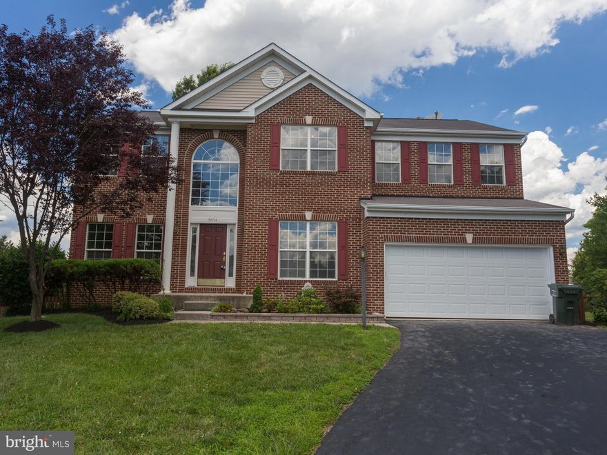 Brick Colonial with 2 car garage and large drive way for 4+ cars. Freshly remodeled- paint, carpet, granite counter tops, stainless steel appliances. Hardwood floors on main level. Walkout basement with 5th bedroom and full bath. Laundry on upper level. All on a quiet cul de sac. Kitchen over looks playground. No HOA. Close to Old Town Manassas, Rte 28, PW Pkwy, 1 mile to free parking - VRE to DC.