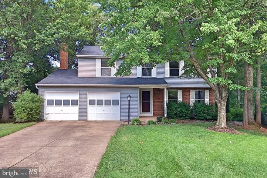 Enjoy the privacy of a singe family home in this fresh 4 bedroom 2.5 bath colonial.  New paint and carpeting throughout.  Hard to find large rooms.  Private backyard with a 2 year old large deck.  Brand new HVAC system keeps you warm in the winter and cool through Virginia summers.  2 car garage with separate doors.  Just waiting for you to move right in!