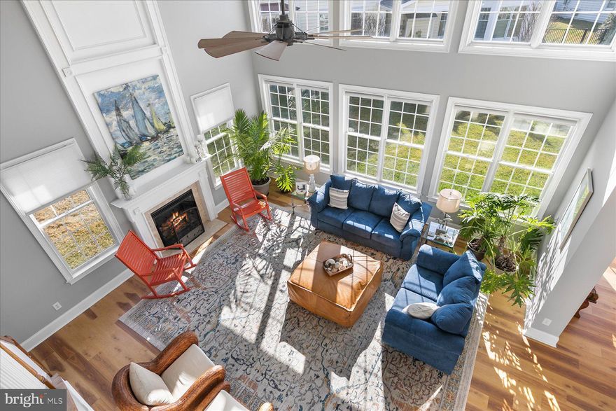 Welcome to this stunning listing in the premier waterfront community of White Creek at Bethany.  
37486 Seaside Drive is a  beautiful 4-bedroom, 3.5-bath sanctuary spanning nearly 4000 sqft. 
Whether you're searching for a primary residence, a vacation retreat, or a smart investment, this home is an effortless choice. The open-concept floor plan is anchored by luxury vinyl plank flooring, a cozy gas fireplace in the great room, and a gourmet kitchen equipped with granite countertops, stainless steel appliances, and a central island perfect for gathering.

Designed to maximize the coastal setting, the home features a light-filled sunroom and multiple balconies that offer serene views of the private backyard pond and the distant bay—ideal for sipping morning coffee or watching sunset hues reflect off the water. The layout includes a generous primary suite with a walk-in closet and en-suite bath, plus flexible guest quarters and a spacious two-car garage.

Residents enjoy top-tier amenities including a clubhouse, outdoor pool, fitness center, tennis/pickleball courts, and a day dock for kayaking on White Creek. 
Located just minutes from the boardwalk and beaches of Bethany, this turnkey gem is ready for you to start making memories immediately.