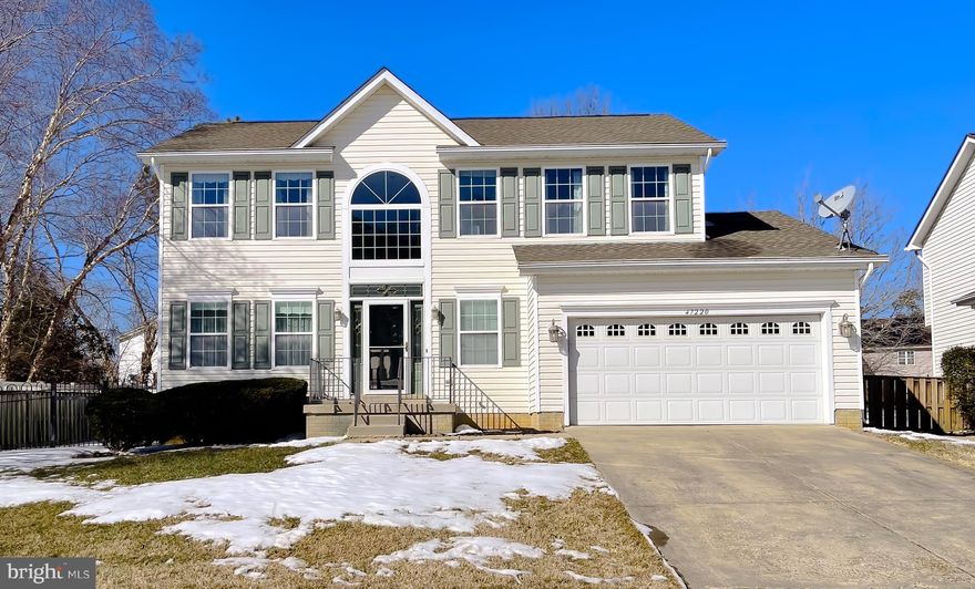 This well-maintained two-story home offers a classic and comfortable layout with 3 bedrooms and 2 full baths on the upper level, plus a convenient half bath on the main floor. Built in 1998 and carefully cared for, the home provides a clean, move-in-ready starting point for buyers ready to make a home their own.

Big-ticket items have already been addressed, including a newer roof and HVAC system installed in 2018, along with gutter guards for added peace of mind. The unfinished basement offers valuable storage now and the opportunity to expand living space in the future.

An attached two-car garage and a sizable backyard make everyday living easy, with room to relax, entertain, or grow over time. A solid home with great potential — perfect for first-time buyers looking for comfort, value, and long-term opportunity.

The rear yard showcases an attractive retaining wall that creates beautiful elevation for planting, complete with charming rear steps and built-in planters.