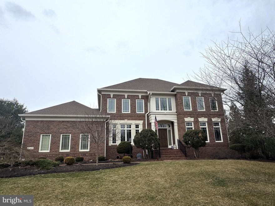 Welcome home to this stately Gulick built four sides brick home with an incredible resort style back yard with pool & peacefully situated on over an acre in Red Cedar West! The grand foyer with curved staircase greets you as you enter this home. The spacious living room leads to a private office with separate sitting room. Large dining room with upgraded lighting. Gourmet kitchen with tons of cabinetry, center island, walk-in pantry & large breakfast room with views of the rear yard. Spacious family room with gas fireplace opens to the outdoor living space. Main level laundry room too! The large upper level primary suite features a sitting room, tons of closet space & luxurious bath with soaking tub & separate shower. Three additional bedrooms, two additional bathrooms & reading nook complete the upper level. Fully finished walk-up lower level with recreation room, custom bar, media room, exercise room, storage, 4th full bath & large 5th bedroom with sitting area. The incredible outdoor living space features covered deck, patio with firepit & heated saltwater pool! The fenced rear yard also features a large playground, fenced gardening area & peach/apple/plum trees. Customized garage with epoxy flooring, additional lighting & wainscot walls too! Many recent upgrades including refinished hardwood floors on the main level (2024), roof (2023), water heater (2023), windows/doors Marvin Ultimate Brand (2022), uplighting in front of home (2022), furnace/steam humidified/air conditioning systems (2018) and more!