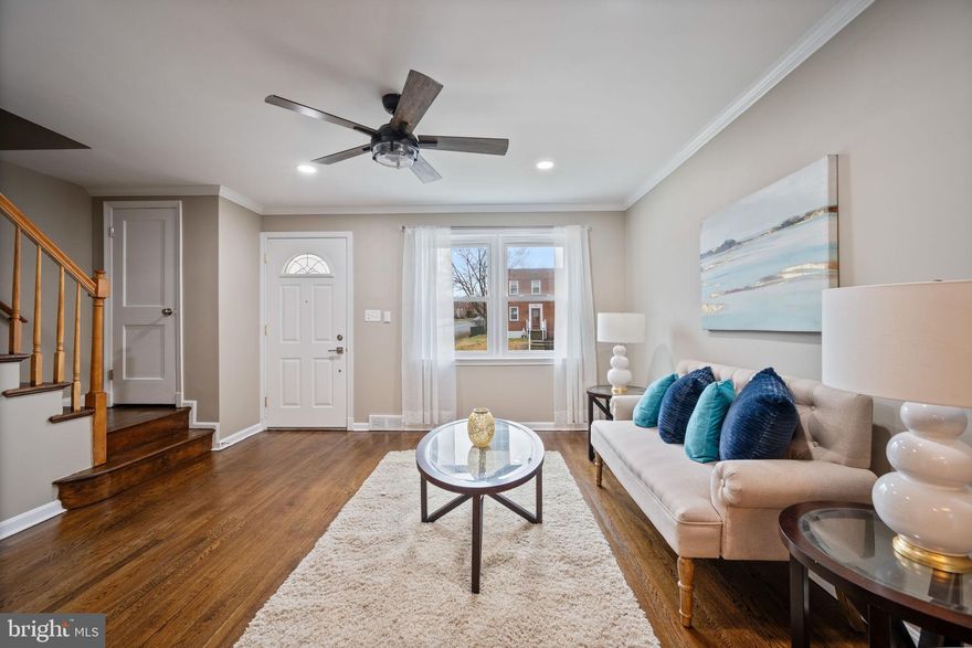 *$5,000 SELLER CREDIT TO BUYER with acceptable offer!!! BRAND NEW Renovated townhouse featuring clean, modern finishes throughout. BRAND NEW heating & AC systems AND new siding. Bright and inviting living room and dining room with gleaming refinished hardwood floors leads to all new kitchen! Upper level includes new full bathroom and 3 bedrooms all with refinished hardwood flooring.  The lower level offers a great club room and new full bathroom—perfect for additional living space or guest accommodations. Enjoy outdoor living with a covered rear patio and fenced backyard, plus private parking pad! Completely move-in ready!