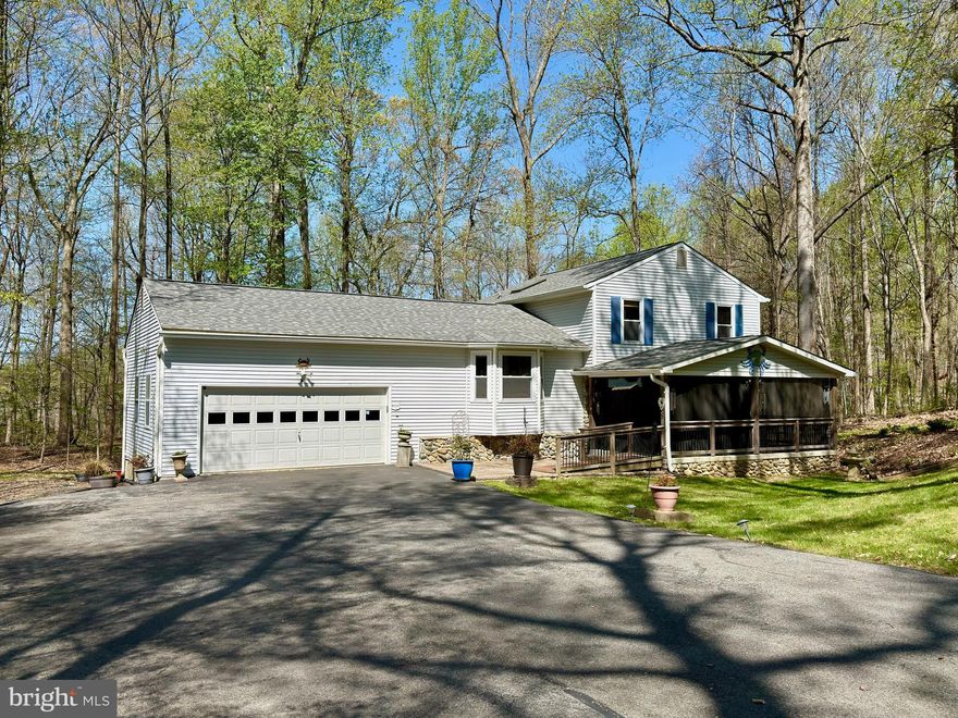 Lakefront Community Living Meets Country Comfort!
Escape to the best of country living in this stunning 3 bedroom, 3 bathroom Split-Level home, perfectly situated on an over 1 -acre cul-de-sac lot in the highly sought-after, lake-privileged community of Lake Karylbrook. Whether you are an avid angler or a nature lover, you’ll enjoy exclusive access to a private lake  known for some of the best fishing in the state. 
Designed for Living & Entertaining, the main level boasts a, beautifully opened-up kitchen featuring a large center island, built in pantry,  mainly all stainless steel appliances, and a seamless flow into the living areas, it’s the perfect hub for hosting or quiet morning meals. 
The spacious lower-level family room offers a warm retreat centered around a classic brick fireplace, now updated with a propane freestanding stove. This level also provides direct access to the rear deck, perfectly blending indoor comfort with outdoor tranquility.
Exterior & Accessibility Curb appeal shines with elegant stone veneer accents and a charming front porch, which includes a handicap ramp for easy accessibility. The backyard is a private, wooded sanctuary where natural beauty abounds. With scenic views located directly behind the property, (it backs up to BGE's right of way) your backyard is a gateway for hiking, exploring, or horseback riding. The Hobbyist’s Dream 2-Car Garage features a large enclosed addition, ideal for a workshop, home gym, or storage. The oversized paved driveway provides plenty of space for parking and storing an RV, boat, or trailer. Enjoy peace of mind with major updates already handled: the roof and HVAC were both replaced in 2017. 
Located just minutes from the vibrant attractions of Chesapeake Beach and the Bay, this home offers a serene lifestyle with an easy commute to Joint Base Andrews (JBA), Pax River, Annapolis, and DC. All this is nestled within an exceptional community with a voluntary HOA of only $50/year! Don't miss your chance to own this rare piece of paradise—schedule your tour today!