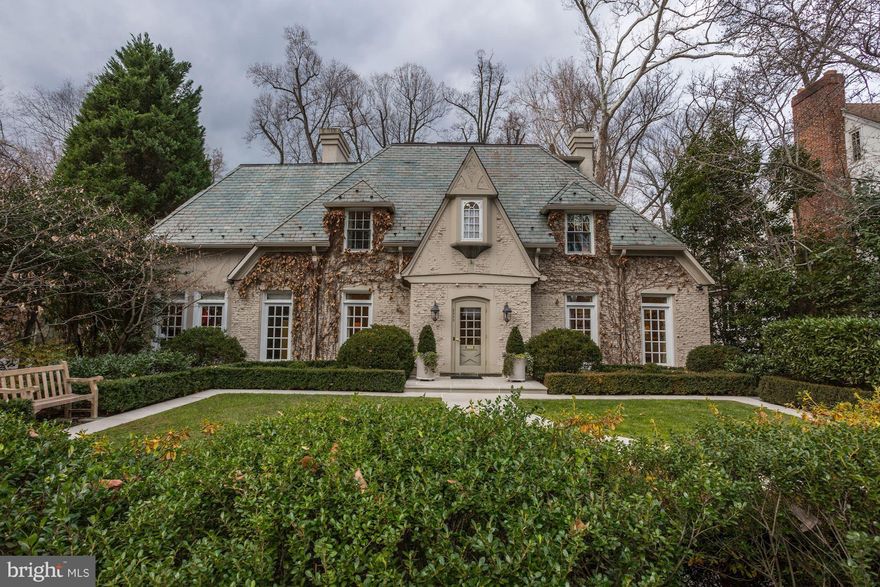 Entered for comp purposes only. Fabulous & enchanting  5,500+ sq ft "cottage" on one of Wesley Heights' most beautiful streets. Fully renovated & improved by Anthony Wilder with premium finishes & equipment, while retaining its 1928 charm & character. 5 BR/4 FB/2HB, separate detached & heated garage for 2 cars, wine room, home office.  Iconic Parisian skylight on 3rd level featured in mags.