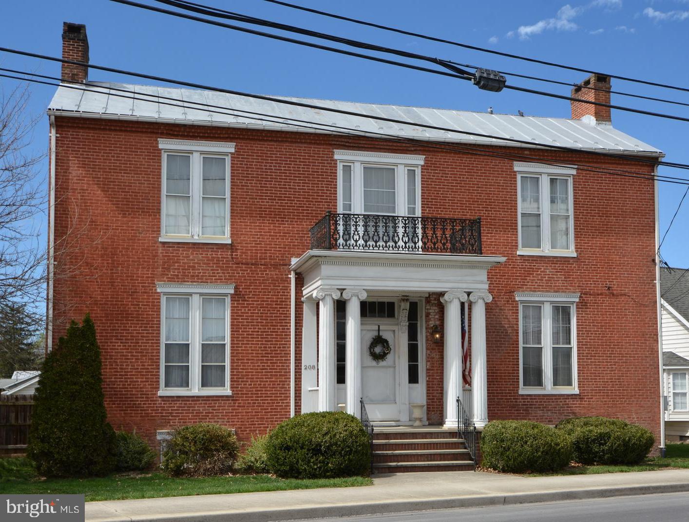 Stunning, historical home in the center of Moorefield, WV. The front portion of the home was built between 1853-1854 and the reminder of the home was built before the beginning of the Civil War. The original owners sold the property in 1874 to the Duffey Methodist Episcopal Church South, who held title to the property for the next 130 years. It was used by the Church as a parsonage. Since it's sale by the church in 2004, the house has had only two owners.
The new owner of this beautiful home will be only the 5th owner in 175 years!
This home boasts 4 spacious bedrooms, 2 full bathrooms (one of which has been recently updated by owner), a formal dining room, living room, parlor, beautiful Georgian staircase, hardwood floors, crown molding, and large windows that allow for tons of natural light throughout. Note: Living room or Parlor could be converted to a 5th bedroom, if desired. A fun detail about this home is the bonus staircase that goes from the kitchen to one of the upstairs bedrooms.
This building is ideal for residential living, but is also zoned for some commercial businesses. (Please contact the local zoning office to verify what businesses are and are NOT permitted in this area.)
Home comes fully furnished with vintage and antique beds, dressers, tables, chairs, artwork and decor. (Few exceptions apply).
NewTown Realty encourages all potential buyers and their agents to verify the information provided. NewTown Realty makes no representation as to the accuracy or reliability of the information that is contained herein. Buyers are encouraged to confirm the information prior to making an offer.