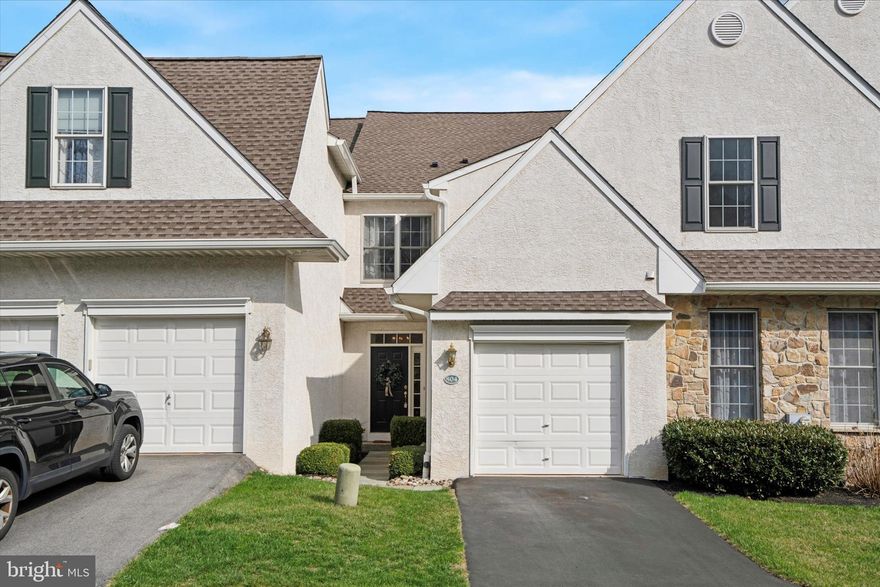 Welcome to 804 Whispering Brooke Drive, a beautifully updated townhome in the sought-after Penn’s Preserve community. This stunning home has been thoughtfully enhanced with modern upgrades, making it truly move-in ready. Step inside to discover an open and airy floor plan featuring gleaming hardwood floors, abundant natural light, and stylish finishes throughout. The spacious kitchen boasts stainless steel appliances, granite countertops, and ample cabinet storage. A charming dining area, highlighted by an elegant chandelier, flows seamlessly into the inviting living room, complete with a cozy marble fireplace—perfect for relaxing evenings.  Upstairs, the serene primary suite offers a spa-like retreat with a soaking tub, dual vanity, and a glass-enclosed shower. Two additional bedrooms, a well-appointed hall bath, and convenient second-floor laundry complete the upper level. The finished walk-out basement expands your living space, offering endless possibilities for a media room, home office, or gym, along with additional storage. Step outside to the rear deck and take in the peaceful views—ideal for morning coffee or evening unwinding.  Additional features include a newer HVAC system, main-floor laundry, recessed lighting, and an attached one-car garage with inside access. Enjoy maintenance-free living with HOA amenities covering lawn care, landscaping, snow removal, and more.  Ideally located within the award-winning Great Valley School District and just moments from scenic nature preserves, walking trails, and major commuter routes, this exceptional home is ready for its next lucky owner. Don’t miss your chance—schedule a tour today!