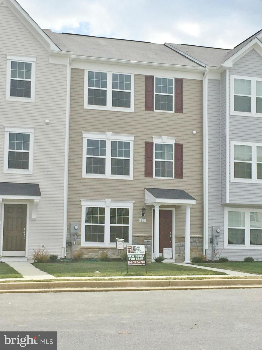 Ready Now! Here's your chance to own a new home with privacy! Backing to the wood line, you will find this 3BR, 3.5 BA home will suit all your needs. Nice master suite with deluxe bath, kitchen island, spacious living room! Stylish stone detail on the front. Great Bunker Hill location convenient for commuters to VA, MD & DC!