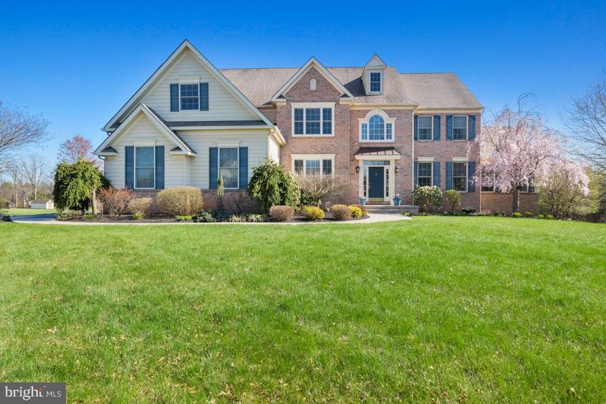 **Showings begin at the Open House on Saturday** Welcome to 930 Ashbourne Way, a stunning estate home set on 3 acres, the largest lot in desirable Ashbourne Estates—within the Souderton School District. Offering over 3,600 square feet of living space, this 4-bedroom, 2.5-bath home seamlessly blends classic elegance with modern functionality. A grand staircase sets the tone as you enter, formal living and dining rooms are to the right -- perfect for entertaining. To the left an in-home office.  The heart of the home is the spacious gourmet kitchen, which flows effortlessly into a dramatic two-story family room featuring a cozy gas fireplace, custom-built ins and abundant natural light. The main living area also has a lovely bright and airy conservatory that provides the perfect space for an additional home office, reading room, or sun-filled retreat. Designed for today’s lifestyle, the home features a large laundry/mudroom complete with built-in cubbies and a convenient charging station—keeping everything organized and within reach. Upstairs, the primary suite is a true retreat, highlighted by a massive custom-designed walk-in closet and a private en-suite bath. Three additional generously sized bedrooms and a hall bath with double sinks complete the second level. The full unfinished basement offers endless potential—whether you envision a home gym, media room, or additional living space—plus ample storage.  Step outside and enjoy the beauty and privacy of your expansive lot, enhanced by landscape lighting and a front yard irrigation system. Additional upgrades include a whole-house generator for peace of mind and solar panels that help power the home efficiently and cost effectively. Walk to Skippack village to shop, dine or watch the 4th of July Parade.  A rare opportunity to own one of the premium lots in Ashbourne Estates—combining space, functionality, and thoughtful upgrades.