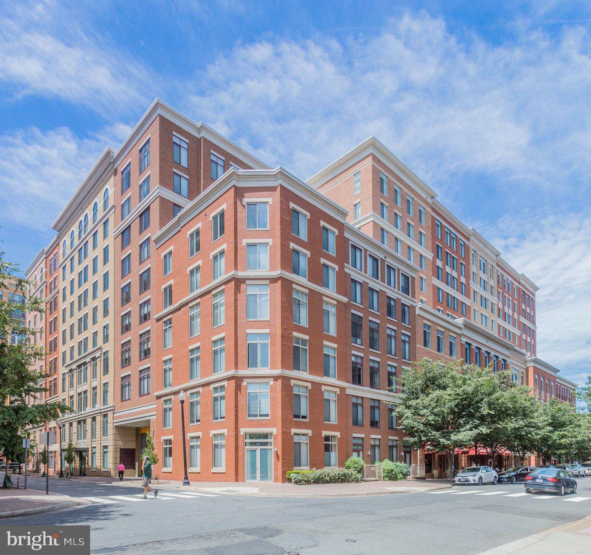 Beautiful condo in Clarendon. Restaurants and shopping are steps away, as well as a short walk to the Metro. This sun filled unit has two bedrooms and 1.5 baths. The open floor plan offers newly refinished hardwood floors, a newly renovated kitchen with gray Shaker style cabinets, white quartz countertops and nice view from the balcony! The washer and dryer have also been recently replaced! One parking space.
