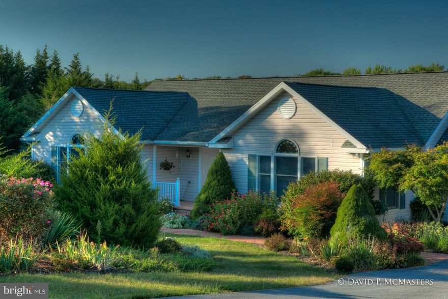 POTOMAC WATERFRONT large 1 level  3 BR home w/ truly exceptional landscaping. Long lawn slopes to river. Fountains, walkways, flowers everywhere. Raised beds. 2 2 car garages.Full high ceiling unfin w/o bsmt. Wonderful views from house + deck. Wood + tile floors, sun + family rooms, sweet bath mural by pro artist owner. Lovely , lovely home on great lot. Spot for private boat ramp. Island.