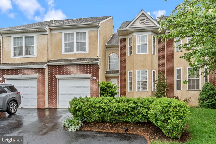 Luxury 3BR/2.5BA townhome in the desirable Enclave at Belle Aire! Elegant stucco and red brick exterior with beautifully upgraded interior featuring luxury vinyl plank flooring, recessed lighting, and detailed crown molding. Spacious living/dining area with bay window—ideal for entertaining. The cozy family room boasts a gas fireplace and opens to a chef’s kitchen with 42” white cabinetry, quartz countertops, tile backsplash, stainless steel appliances, and dual pantries. Powder room features a marble-topped vanity. Upstairs, the primary suite includes LVP flooring, a large walk-in closet, and a private ensuite with double vanity and stall shower. Bonus sitting room/office with cathedral ceiling! Two additional bedrooms share a full bath. The unfinished lower level offers potential for more living space. Relax on the composite deck overlooking serene natural views. Major updates include Roof (2020), Deck (2021), Water Heater (2022), and Washer/Dryer (2019). Conveniently located!