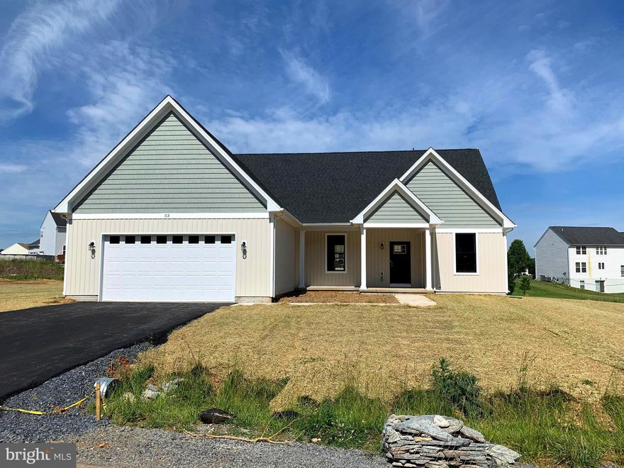 UNDER CONSTRUCTION IN UPSCALE NEIGHBORHOOD ON A 0.55 ACRE LOT. COMPLETION ANTICIPATED IN MID TO LATE JULY. Open floor plan rancher on a full basement with two car garage. Features include: Large Great Room / Spacious Kitchen with stainless steel appliances, granite counters, island, and bumped out dining table area / Master Suite with walk in closet / Master Bath with soaking tub and separate ceramic shower / Full Basement with roughed in plumbing for a future full bath.