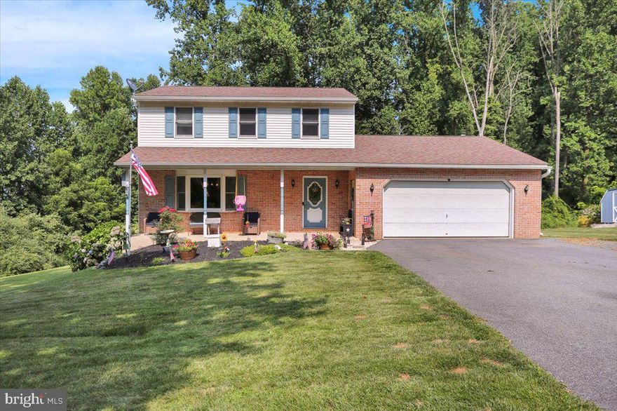 Welcome to 11 Caitlin Drive located in Mansion View Estates in the Twin Valley School District. This 2 Story brick home has been thoughtfully updated and meticulously maintained by its current owners. Privacy is yours on this 1.46 acre corner country lot with a wooded backdrop. Travel the macadam driveway and fall in love with this homes gorgeous curb appeal featuring a large front yard, covered front porch, and beautiful landscaping.A tile foyer leads into a perfect flowing floor plan featuring an eat in kitchen with cherrywood cabinets, upgraded countertops, tile backsplash, and stainless steel appliances. Formal living room with a beautiful bay window. Large formal dining room. Newly updated powder room. Family room with gorgeous LVP flooring, a brick hearth/wall with a wood burning stove, and French doors that lead to a 10x14 deck that overlooks the backyard. Upstairs is a full updated bathroom with a granite countertop vanity and tub/shower combo. Large cozy master bedroom with double closets and enough room to house a king size bed. 2 additional private generous size bedrooms both with new flooring and ample closet space. Walk out basement could easily be finished to provide additional living space. Peace of mind is yours with a newer roof and well maintained mechanicals. Tucked back on a quiet rural road yet very convenient to major highways. You will love to call this your Home Sweet Home!