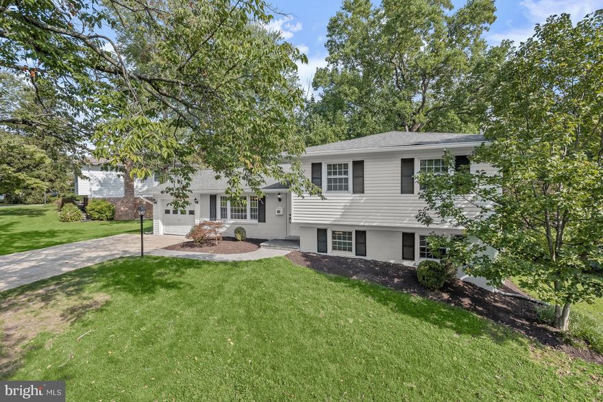 Welcome to 754 Tiffany Drive nestled in the highly sought after community of West Riding. This sprawling split level home offers many quality updates along with its prime location! The open concept design features gorgeous hardwood floors and seamlessly connects the living room, dining area, and kitchen creating an ideal space for entertaining guests or spending quality time with family; Eat-in kitchen equipped with granite countertops, crisp white cabinetry, breakfast bar, and a breakfast room
Light filled living and dining rooms offer access to the expansive deck with scenic views of surrounding trees providing a sense of privacy and tranquility; Primary bedroom adorned with an en-suite full bath; Three additional bedrooms, full bath, and a cedar closet completes the upper level; The lower level offers a family room anchored by a brick profile fireplace, bedroom, full bath, laundry room; Step down to the spacious game room with new luxury vinyl plank flooring and a lovely dry bar; This remarkable property aims to please and is truly the embodiment of Maryland’s good life! Community Amenities: Enjoy close proximity to Diamond Farm Park, the trails of Seneca Creek Park, Popular Quince Orchard Plaza, Kentlands, Rio, Downtown Crown, and the NIST campus complex. Convenient to the Metro, I-270, I-370.