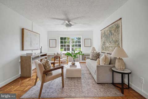 Photo of 1602 W Abingdon Drive #101, ALEXANDRIA, VA 22314 (MLS # VAAX2065386)