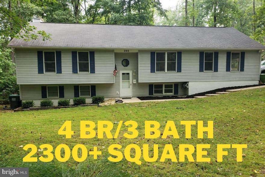 Spacious 4 Bedroom home in Lake of the Woods with new deck overlooking backyard. First floor features an open floor plan with vaulted ceilings and a huge living room and updated kitchen with stainless steel appliances. The top floor also includes a primary bedroom suite with an en-suite bathroom, second bedroom, and an updated hall full bathroom. The lower level of this split foyer home features a unique second primary owner's suite with huge walk-in closet, fireplace, walkout to patio, and a full bathroom. A 4th bedroom is also on the lower level along with a bonus playroom area with built in slide and balcony play area. You have to see to believe this home. Over 2300 finished square feet of living space plus a huge garage with mounted TV, extra refrigerator, freezer, and workbench.  All this plus the amenities of Lake of the Woods included pools, golf, equestrian center, and more.