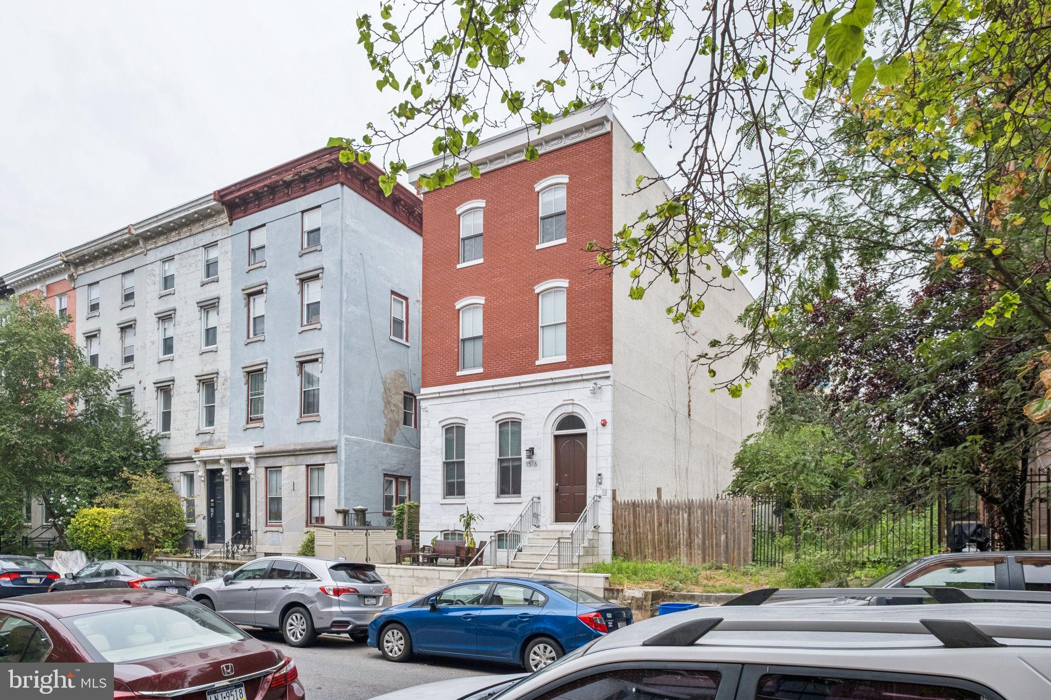 Historic Six-Unit Trophy Property in the Heart of Fairmount
Presenting 1516 Green Street, a rare opportunity to acquire a trophy multifamily asset on one of the most architecturally significant and sought-after blocks in the 19130 zip code. Nestled in the heart of Fairmount, this stately six-unit building features a striking Italian-imported marble façade, a spacious front porch, and a private rear yard — all contributing to its timeless curb appeal.
The building is situated on a 2,456 SF lot with 25 feet of frontage along beautiful Green Street, surrounded by tree-lined sidewalks and historic townhomes. The building is approximately 6,450 SF.
Unit Breakdown:
(2) expansive 4-bed, 3-bath bi-level units (lower and ground levels)
(4) well-appointed 2-bed, 1-bath units (second and third floors)
All units feature spacious layouts, modern finishes, high ceilings, and thoughtful renovations that preserve the property’s historic charm. The building is fully occupied by quality tenants, offering strong in-place cash flow and long-term upside.
Prime Location:
Located just blocks from Broad Street and Spring Garden, with walkable access to public transit, cafes, gyms, restaurants, and cultural institutions. The Art Museum, Kelly Drive, and Center City are all just minutes away.
Whether you're a seasoned investor or an owner-user seeking a legacy asset in one of Philadelphia’s most coveted neighborhoods, 1516 Green Street offers a unique opportunity to own a piece of architectural history with income-producing potential.