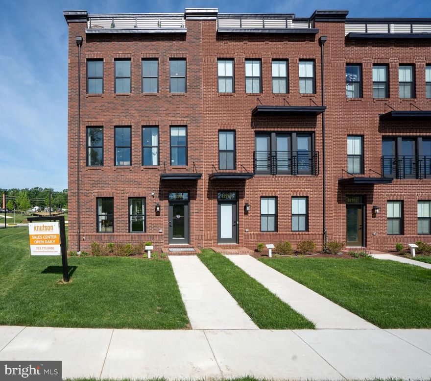 New Construction Townhome. Estimated Settlement January 2026. (Price includes structural options) For a limited time the buyer is able to select design options.
Walking distance to Brambleton Town Center.
Brick Front! 2 Car Garage! 5 Bedrooms! 4 Full Bathrooms and a Powder Room!
One of the 5 bedrooms is on the ground floor entry level.
The Designer Kitchen boasts an 11-foot island and includes quartz countertops, a gas cooktop with a vented hood, a built-in microwave and wall oven, a 3-door bespoke refrigerator and dishwasher. The Family Room includes 2 Sliding Glass Doors leading to a convenience deck. This is an open and light-filled floor plan and features a bedroom, full shower bath, loft and rooftop terrace on the 4th level.
*NOTE: Price is subject to change without notice or obligation.  The Knutson Companies is a locally owned home builder who takes pride in delivering award-winning architecture for you to enjoy living in every day.
Please contact us for an appointment to learn more and tour our model home located at 22786 Hanson Overlook Terrace, Brambleton, VA 20148
**Photos are of the model home.