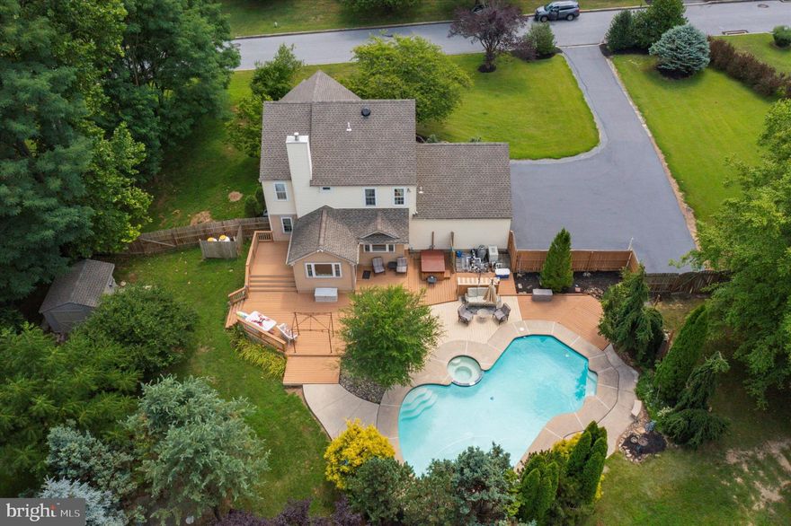 Welcome to your dream home in Downingtown! This spacious and inviting 4-bedroom, 2.5-bathroom single-family residence offers the perfect blend of comfort, style, and functionality. The main floor consists of an office, ideal for remote work or study. The living room features a cozy gas fireplace and an open concept design that seamlessly flows into the eat-in kitchen. The kitchen has a large peninsula island that seats five and includes the laundry area for added convenience. The dining room  has elegant chair rail, crown moulding, and includes a charming bay window for plenty of natural light. The sunroom opens to a large back deck, perfect for relaxing and entertaining. Completing this level is a convenient powder room. 

On the upper level you will find the spacious master bedroom with two walk-in closets and a luxurious master bathroom. Three additional bedrooms and a full bathroom provide ample space for family and guests. 

The finished basement provides a cozy atmosphere with carpet flooring and speakers. It also has plenty of room for all your storage needs.

The private, fenced in backyard is a serene oasis with mature landscaping and has a shed for extra storage space. The in-ground pool is ideal for summer fun. The pool house has a new roof, electric, and includes a workshop area. Enjoy gatherings on the patio with a fire pit. You have plenty of parking with the attached 2 car garage and driveway. 

Don't miss the opportunity to make this beautiful home yours. Schedule a viewing today and experience all the wonderful features this home has to offer!