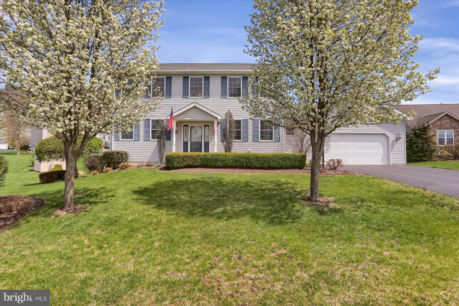 Situated in the desirable Brockerhoff Heights neighborhood, this well-maintained 4-bedroom, 2.5-bathroom home offers a spacious and thoughtfully designed layout perfect for both everyday comfort and entertaining. The main level features a bright and open eat-in kitchen with an island and ample cabinet space, flowing effortlessly into a warm and inviting family room with a propane fireplace, ideal for cozy evenings at home. A formal dining room provides space for hosting gatherings, while the front room offers flexibility as a home office, playroom, or additional living area to suit your lifestyle. A first-floor laundry room adds extra convenience. Upstairs, retreat to the generous primary suite featuring a private full bath with dual vanities. Three additional well-sized bedrooms and a full hall bath complete the second floor. Step outside to a covered back deck, ideal for outdoor dining, relaxing, or entertaining, that overlooks the large backyard. Notable updates include a new heat pump installed in 2021, providing energy-efficient comfort year-round The unfinished lower level provides excellent storage or potential for future finished living space. A spacious two-car garage rounds out this move-in ready home. Enjoy quiet neighborhood living with close proximity to downtown Bellefonte and easy access to I-99.
