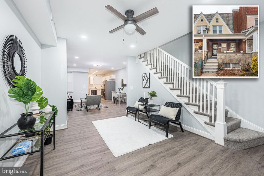 PICTURE PERFECT RENOVATION WITH 3 FINISHED LEVELS & OFF STREET PARKING!  Features include wood flooring throughout the main level, a spacious living room, separate dining area, designer kitchen with Quartz counters, ss appliances, & tile backsplash, upper level with 3 generously sized bedrooms & 1 full bath, a fully finished basement with a family room and a 2nd full bath with a large walk-in rain shower, and convenient covered and fenced off street parking!  Pack your bags and move right in!