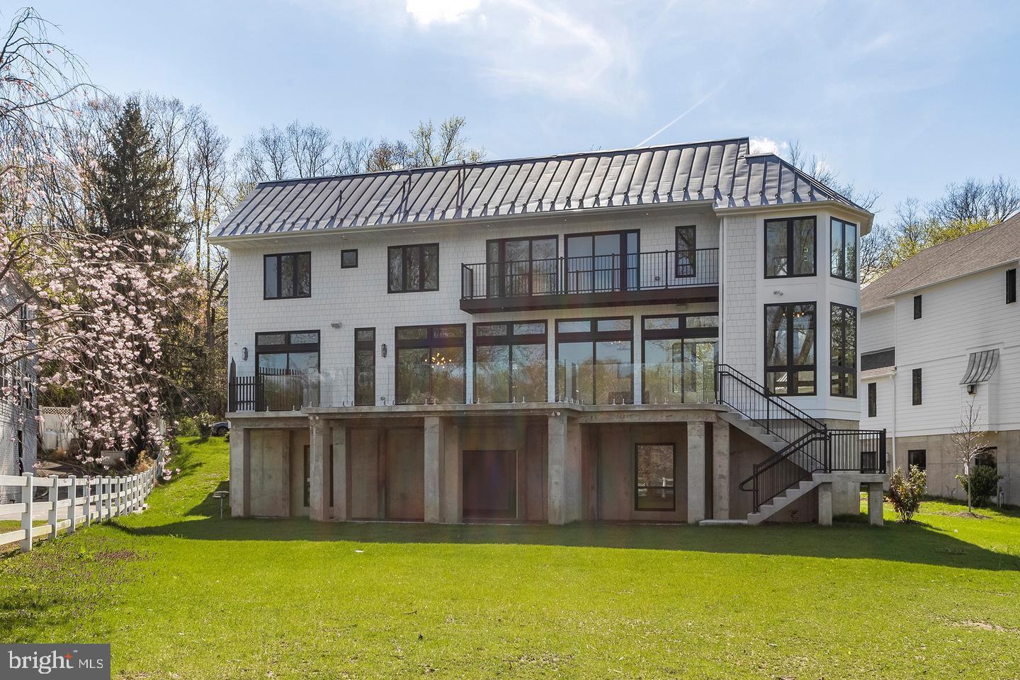 Luxury and never the same view twice!! A Modern Masterpiece for the Sophisticated Buyer
Gladwyne, PA – Lower Merion School District
For those seeking luxury without the maintenance, privacy without isolation, and elegance with an edge – welcome to 310 River Rd.
This stunning glass-wrapped residence offers the perfect blend of low-maintenance living and architectural brilliance along the peaceful banks of the Schuylkill River. Whether you're downsizing but not ready to give up luxury, or you’re a single professional who wants it all, this home delivers.
Top Reasons You'll Love Living Here:
Exclusive Gladwyne Zip Code – One of the most coveted Main Line locations, known for prestige, privacy, and access to everything.
Breathtaking Water Views – Floor-to-ceiling glass offers a front-row seat to nature, every single day.
No Compromise Design – Built by Rufo Properties, designed by Bissinger—this is a showpiece built to impress and built to last.
Lock-and-Leave Simplicity – Concrete foundation, radiant heat, hurricane-grade structure = low upkeep, high peace of mind.
Chef-Quality Kitchen – Waterfall island, quartz, Wolf & Sub-Zero, one-piece backsplash. If you cook, you’ll fall in love. If you don’t, it still looks amazing on Instagram.
Smart Tech Everything – Fully integrated smart home system, custom cabinetry, heated 3-car garage with commercial-grade doors.
Private Outdoor Living – Multiple decks, waterfront serenity, and just minutes to Center City or the Main Line’s best spots.
Ideal for:
Downsizers with older kids out of the house, who still want space and style
A professional or entrepreneur who needs privacy, presence, and a home office with a view
Someone ready for the next chapter—simplified, elevated, and inspiring
Live minutes from:
Center City (20 minutes to West River Drive or I-76)
Top-ranked Lower Merion schools
Boutiques, golf, restaurants, and trails throughout Gladwyne & the Main Line
310 River Road isn’t just a home. It’s a fresh start, a bold statement, and a daily experience of refined living.