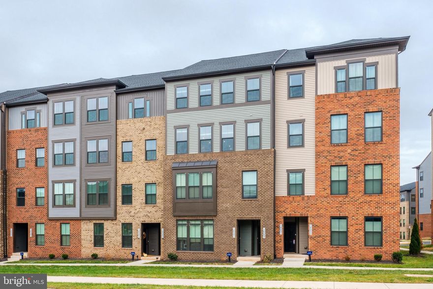 Available for the New Year, this well-appointed townhouse offers substantial living space, ideal for those seeking room to spread out. The floor plan is perfect for entertaining, featuring a large private deck with a custom outdoor gas fireplace,  garage, LED ceiling lighting, and a gourmet kitchen with a large island, stainless steel appliances, and sleek white cabinetry. Large windows and a thoughtful layout fill the home with natural light, creating a warm and inviting atmosphere. This bright and welcoming home combines modern amenities with comfortable living spaces. It includes a full-size front-loading washer and dryer, a dedicated laundry room with a utility sink, a walk-in closet in the second bedroom, and two (2!) walk-in closets in the primary bedroom. Garage outlet present and ready for an electric vehicle charger. Located just minutes from Dulles International Airport, Innovation Station Metro, major commuter routes, Reston Town Center, and local schools, this home is ideally situated for ease and convenience—contact the listing agent to set up a showing.