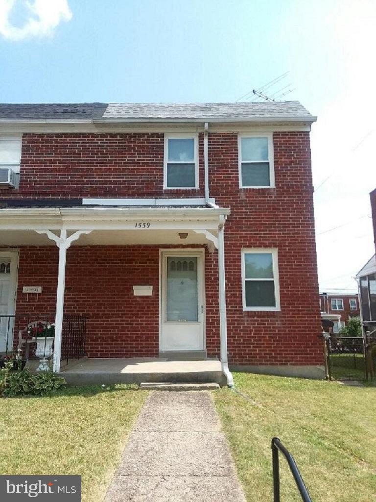 Newly renovated end of group town home. Like moving into a new home: freshly painted with new carpet, new windows,over sized garage,full basement with work area,and hardwood floors