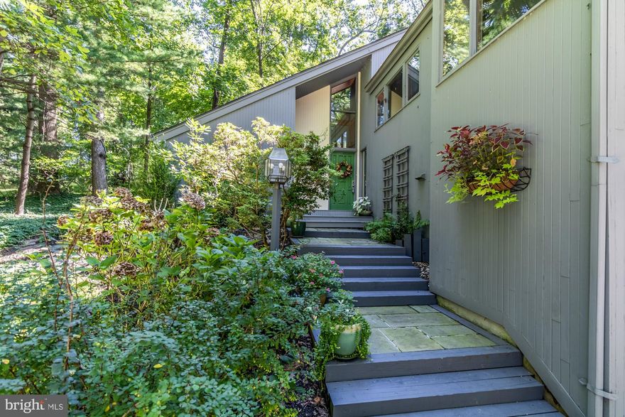 RARELY AVAILABLE: Wonderful contemporary Acorn constructed house in desirable Greencroft community with easy access to Hunt Valley and 83. 4-5 bedrooms, entry level bedrooms, living room with cathedral ceiling and exposed beams, large fireplace, wall of glass to expansive deck overlooking private lush landscaped yard,  recent roof, spacious attached 2 car garage, skylights, loft office space, eat-in kitchen, steps to community pool and adjoins walking paths and fields of AG Center... well maintained and sold AS-IS.