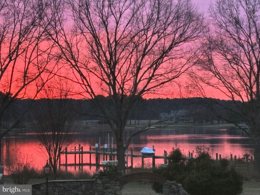 Welcome to Soleil on the Bay! Nestled on nearly 7 acres along the calm, deep waters of Maxmore Creek—just off the Tred Avon River—this exceptional west-facing waterfront property offers the most gorgeous sunsets and wide-open water views providing the perfect blend of privacy, natural beauty, and endless potential. Ideally located between Easton and St. Michaels, it provides easy access to the best of Maryland’s Eastern Shore.

Enter your future family estate down a beautiful, private, tree-lined, fully paved driveway.  Extensive site planning and improvements have already been completed, and the County and MDE have approved a septic expansion to support up to 8 bedrooms.

The estate is beautifully appointed with mature trees, a 20’x40’ waterside pool, and a brand-new, 185- foot, deep-water dock featuring 6’ mean low water, floating docks, fully connected with electrical and water, a jet ski lift, kayak launch, and a 20,000+ pound boat lift with 30 amp, 220 electrical outlet to charge your boat. Two charming guest cottages totaling approximately 2,600 sq. ft. have been remodeled and enhance the property; providing unique opportunities each with its own fully equipped kitchen and multiple bedrooms and bathrooms.  Includes oversized 3 car attached garages. Imagine your friends and family enjoying their own cottage for the utmost in privacy on this family compound.

Additional highlights include 550’ of rip-rapped shoreline, extensive stone hardscaping, brick and paver walkways and patios, and a paved blacktop driveway, making this an extraordinary offering with unlimited potential in a prime waterfront setting.  The grounds are mostly flat with available buildable lot coverage.

The main residence needs to be remodeled or rebuilt and presents a unique opportunity to create your dream home. Architectural plans are already in place for a stunning new main house or design your own dream home.

Easton, Maryland, known as the New Hamptons of the Chesapeake Bay by Forbes Magazine, is conveniently located 1.5 hours from D.C. and Baltimore, and 2 hours from Philadelphia. Just minutes from fine dining, shopping, healthcare, theatres, galleries, museums, golf courses, a country club, a yacht club, and a jet airport.