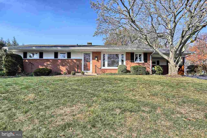 REMODELED BRICK RANCH WITH A VIEW ON A .36 ACRE LOT FEATURES 2,030 SQ FT, 3 BEDROOMS, 2.5 BATHS, TOP-OF-THE-LINE RENOVATIONS INCLUDE REFINISHED HARDWOOD FLOORS, NEW CARPET & CERAMIC TILE, A MASTER SUITE ADDITION W/HUGE WALK-IN CLOSET & BEAUTIFUL TILE BATH, KITCHEN W/GRANITE COUNTERTOPS & ALL NEW STAINLESS STEEL APPLIANCES, 1ST FLOOR LAUNDRY ROOM W/NEW WASHER & DRYER, FULL BASEMENT W/FINISHED BONUS ROOM, FENCED YARD, COVERED BACK PORCH, CARPORT & A 1 YEAR HWA HOME WARRANTY IS INCLUDED... EXCELLENT CONDITION!