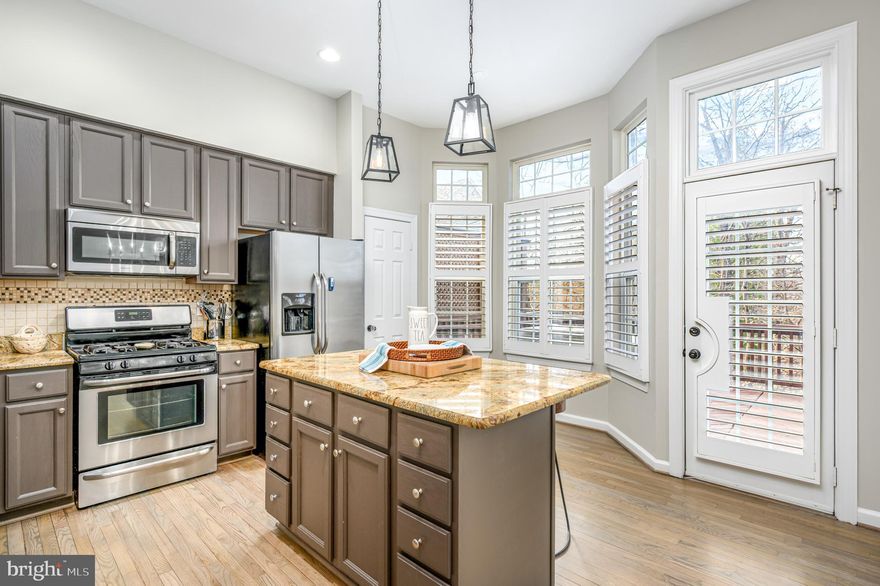 PRICE IMPROVEMENT IN LOWES ISLAND! 

Updates abound in this beautiful Lowes Island townhome!  
* FRESH PAINT AND CARPET MARCH 2025 * NEW ROOF,  SIDING , GUTTERS AND GUTTERGUARDS NOVEMBER 2024 * NEW HOT WATER HEATER 2024 * NEW WROUGHT IRON STAIR PICKETS 2022 * HARDWOOD FLOOR REFINISHED 2022 * HVAC REPLACED 2018  * DECK FRESHLY POWER WASHED AND STAINED * NEW LIGHTING THROUGHOUT * AND MORE! 

Welcome to this beautiful and meticulously maintained townhome nestled in the highly sought-after Lowes Island community. This spacious home offers a perfect blend of modern convenience and comfort, ideal for those seeking both style and functionality.

As you step inside, you’ll be greeted by an open and airy floor plan featuring gleaming hardwood floors, tall ceilings and large windows complete with plantation shutters that flood the space with natural light. The gourmet kitchen is a chef's dream, with stainless steel appliances, granite countertops, and plenty of cabinet space for storage. The kitchen flows seamlessly into the cozy living area, creating an ideal space for entertaining or enjoying quiet moments at home. Enjoy your morning coffee on your freshly power washed and stained, private deck backing to mature trees!

Upstairs, the generously sized bedrooms offer privacy and tranquility. The master suite is a true retreat, complete with a walk-in closet and an en-suite bath featuring dual vanities, a soaking tub, and a separate shower. Two additional bedrooms provide ample space for family, guests, or a home office.

The lower level features a versatile finished basement with gas fireplace, perfect for a recreation room, home gym, or even possible bedroom, your second half bath, laudry room, and garage access. Rear access via slider to backyard.

Additional highlights include a one-car garage with bonus storage room, centrally located just minutes from Reston Town Center and One Loudoun, and easy access to community amenities like parks, trails, shopping and dining.  

Don't miss your opportunity to own this exceptional townhome in one of the area’s most desirable communities!