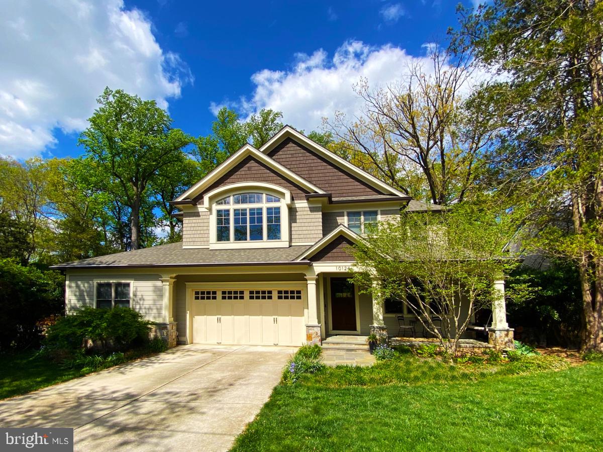 Enjoy living in a superb Bethesda home designed and built by the owner/ architect to meet the need for versatile lifestyles, with high end custom touches throughout, situated on a spacious lot backing to Rock Creek Park. From the moment you enter through the 96” tall wood door your eyes will be drawn to the custom ceiling and wall moldings that adorn the home at every turn. The large home office is located just off the entry foyer for the occasional client meeting. 10 foot ceilings in the family room add to your feeling of space, and the gas fireplace is a beautiful focal point. The gourmet chef’s kitchen is enhanced by stylish light fixtures, beautiful cabinetry and tile work, while offering a 48” range featuring a griddle. A butlers pantry and bar provide for easy entertaining in the spacious dining room. While smaller gatherings take place around the breakfast area with built in bench nook. For most of the year you will enjoy spending hours on the screened porched with vaulted ceiling and wood burning fireplace, while enjoying views of the deep yard with the woods beyond. With multi-generational living in mind, there is a generously sized bedroom suite on the main level, with walk in closet and ensuite full bath (with shower). Sliders lead you to the patio and peaceful quiet yard.
As you head upstairs, your eyes will be drawn to a skylight and decorative moldings. The primary bedroom suite with tray ceiling easily accommodates a king size bed and all your furniture, with up-in-the trees views from the many windows. 2 WIC provide abundant clothing space and the ensuite full bath with spa-like shower and jetted tub is breathtaking. The 3 additional bedrooms upstairs include an enormous room with loft, and 2 bathrooms. The laundry room is where you want it, on the bedroom level, and it provides for lots of linen and other storage.
Downstairs a large recreation room is designed for movie night, game night and general fun (space for a pool table!). An exercise room, and the 6th bedroom with 5th bathroom completes the space.
Nothing has been overlooked: from the EV charger in the garage, to the front porch sitting area with swing, landscape lighting, low maintenance stainless steel gutter screens and Anderson windows, gas hook up for patio grill. The hardwood flooring is unique hickory wood, which can be refinished to your preferred color and sheen. This home encompasses over 6100 sq feet of conditioned space.